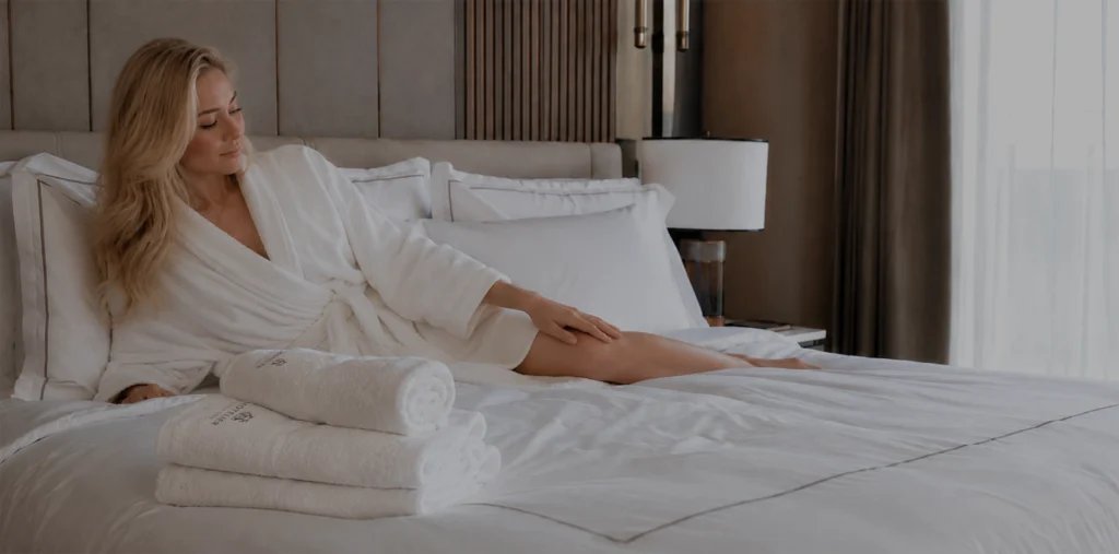A girl on the hotel bed